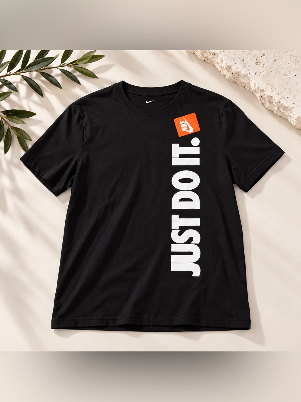 Nike Black Short-Sleeve Tee with Vertical White "JUST DO IT." and Orange Logo